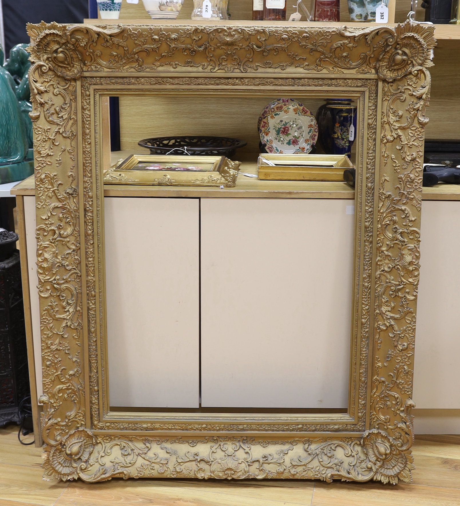 A Victorian gilt gesso picture frame, aperture 90 x 69cm, overall 130 x 106cm, minor faults